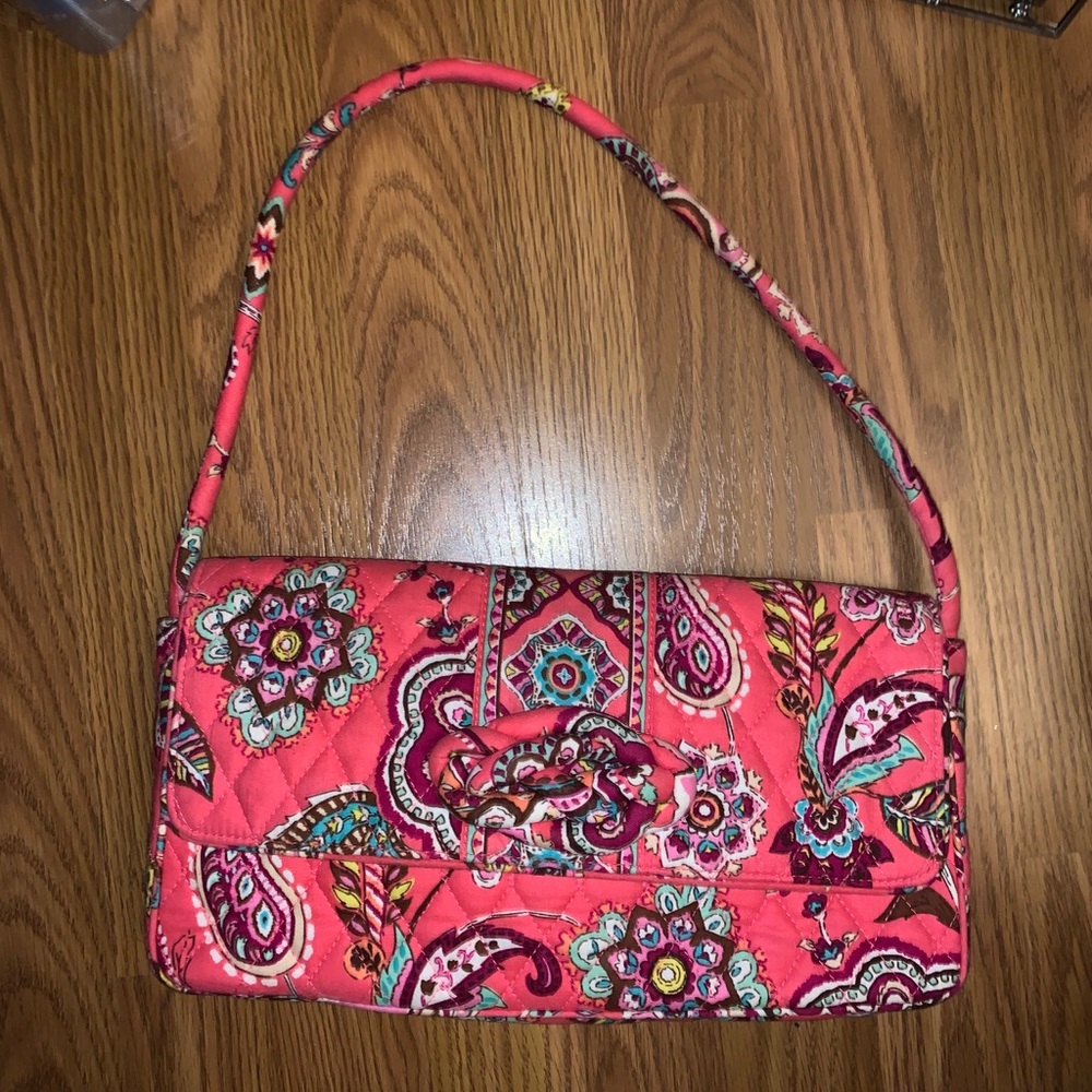 A slightly used Vera Bradley shoulder bag.